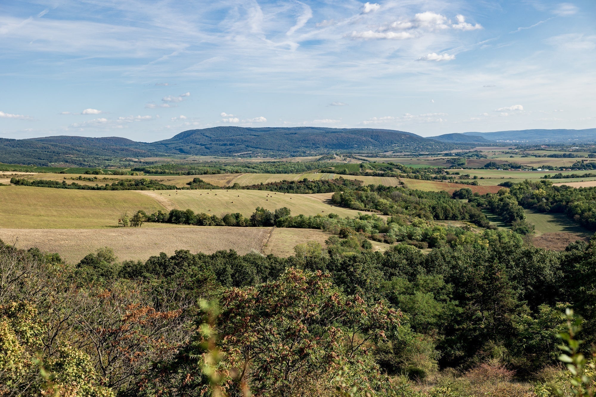 Late summer view og Gerecse mountains with fields and farmlands